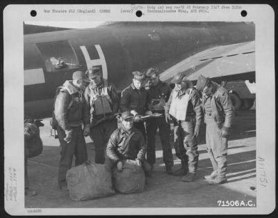 General > A Crew Of The 525Th Bomb Squadron, 379Th Bomb Group, Is Photographed Beside A Boeing B-17 "Flying Fortress" At An 8Th Air Force Base In England On 2 March 1944.