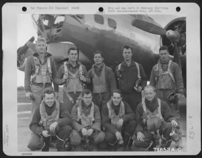 General > Crew Of The 379Th Bomb Group Pose Beside A Boeing B-17 "Flying Fortress" At An 8Th Air Force Base In England.  6 July 1944.