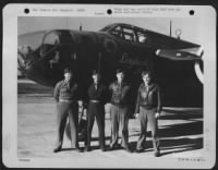 Capt. John V. Cyrus and crew of the 410th Bomb Group pose behind a Douglas A-20 "Havoc" at a 9th Air Force base in England. - Page 1