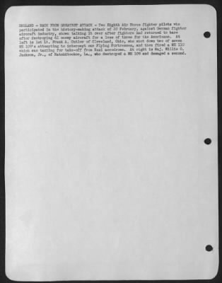 Fighter > ENGLAND-BACK FROM GREATEST ATTACK-Two Eighth Air force fighter pilots who participated in the history-making attack of 20 February, against German fighter aircraft industry, shown talking it over after fighters had returned to base after destroying