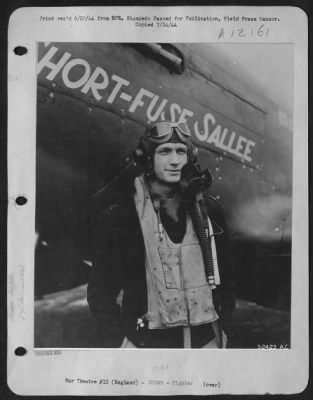 Fighter > Maj. Richard E. Turner, Shawnee and Okla. City, Okla., shown with his plane, "Short-Fuse-Sallee," with 9 1/2 enemy planes to their credit, scores again. Col. James H. Howard ofrmer "Flying Tiger," selected Maj. Turner to take over his squadron when