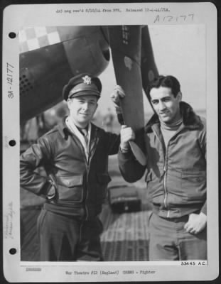 Thumbnail for Fighter > Capt. Duane W. Beeson and Capt. Don S. Gentile pose in front of airplane in England.