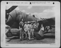 Col. Gabreski poses with his ground crew for a picture just after returning from a mission over France. The Col. Is commanding officer of his squadron, is the leading Ace of the USAAF with 28 German planes to his credit. He hold the Air Medal with 3 - Page 1