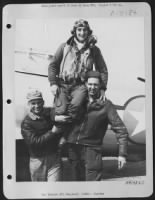Lt. Col. Francis S. Gabreski, U.S. Fighter Pilot, and crew: (left to right) Cpl. Felix Schacki, Gary, Ind., ass't crew chief, Col. Gabreski, and S/Sgt. Ralph H. Safofrd, Ionia, Mich. - Page 3