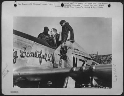 Thumbnail for Fighter > Lt. Col. John D. Landers, 24-year-old ace from Joshua, Texas, settles into the cockpit of his North American P-51 Mustang before taking off to lead the 78th Fighter Group over the Rhine Saturday 24 March 1945, to sweep the area, looking for German