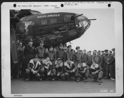 Thumbnail for Ground > England-Crew of Boeing B-17 "Hell's Angels" by nose of ship. Kneeling left to right, Ground Crew: oflmer, West, Kosilla, Wegrzyn, Fairfield, Touhey. Standing-Flight Crew; Johnson, DeCamp, McElwain, McCord, Zeller, Briggs.