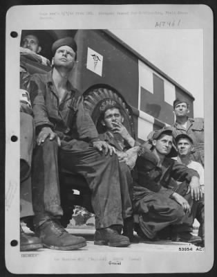 Thumbnail for Ground > ENGLAND-Loyal always to their plane, the ground crew of "Flying Crusader" gather together to await its return from each mission. Shown are left to right: M/Sgt. John Coltran, Red Bank, N.J.; Sgt. Eugene Hochmuth, Buffalo, N.Y.; Pvt. Fred Hofley