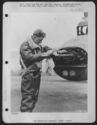 Thumbnail for Gunner > "Hottest tail in town." Preparing his tail guns in last minute readiness is S/Sgt. Joseph F. Kotlarz, son of Mrs. Stella Kotlarz, 2820 F St. Omaha, Nebr. Sgt. Kotlarz reigns over the tail gun position in the ofrtress, "KIPLING'S ERROR III" which is