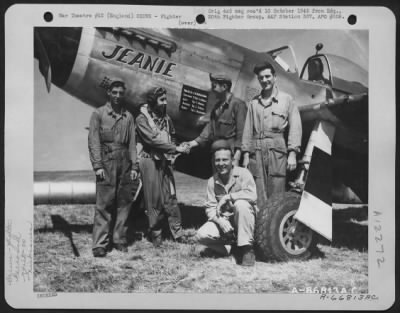 Thumbnail for Fighter > As Other Members Of The Ground Crew Look On, Lt. S.D. Bradshaw, Pilot, Shakes Hands With The Ground Crew Chief Of His North American P-51 Mustang 'Jeannie' Of The 20Th Fighter Group.