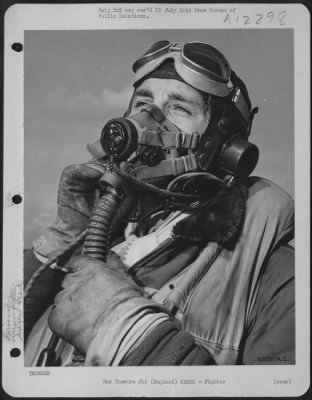 Fighter > Lt. Colonel Francis E. Gabreski Tests His Oxygen Mask Before Take-Off On A Bomber Escort Mission.  England, 4 July 1944.