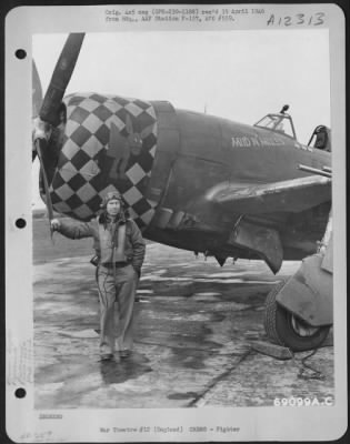 Fighter > Captain Newhart, Pilot Of Republic P-47 "Mud N' Mules" Of The 350Th Fighter Squadron, 353Rd Fighter Group, Stands Beside His Plane At An Airbase In England.