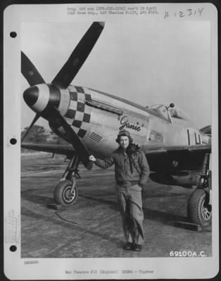 Fighter > Captain W.J. Price, Pilot Of The 350Th Fighter Squadron, 353Rd Figher Group, Stands By His North American P-51 "Janie" At An Airbase In England.