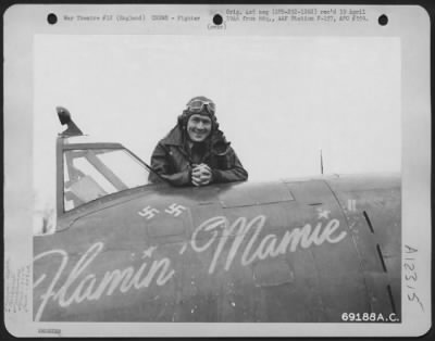 Fighter > Lt. W.W. Odum, Pilot Of The 350Th Fighter Squadron, 353Rd Fighter Group, Poses For The Photographer Shortly Before He Climbs Into The Cockpit Of His Republic P-47 "Flamin' Mamie" At An Airbase In England.