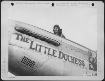 Thumbnail for Fighter > Burkholden, Pilot, Looks Over The Nose Of His North American P-51 'The Little Duchess' Of The 364Th Fighter Group, 67Th Fighter Wing, At The 8Th Air Force Station F-375, Honnington, England.  5 February 1945.