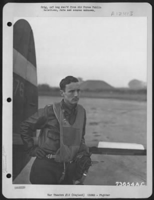 Fighter > Capt. Walter C. Beckham, De Funiak Springs, Fla., Poses By The Tail Of A Republic P-47 At An Air Base Somewhere In England.