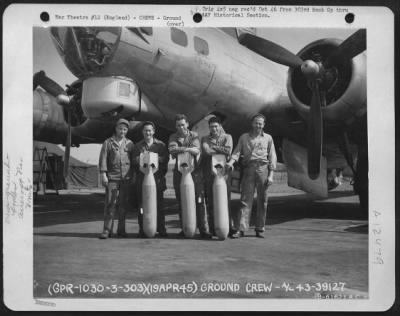 Ground > Ground Crew Of The 359Th Bomb Squadron, 303Rd Bomb Group, Pose With Three Deadly Bombs.  England, 19 April 1945.  Aircraft No 43-39127.