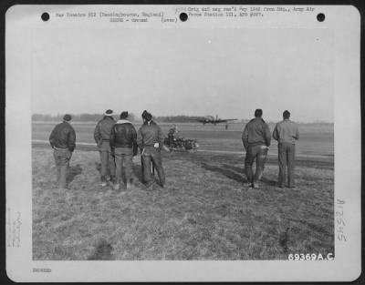 Ground > Ground Crew Members Of The 91St Bomb Group "Sweat Out" The Return Of The Bombers To Their Base In Bassingbourne, England, From A Mission.