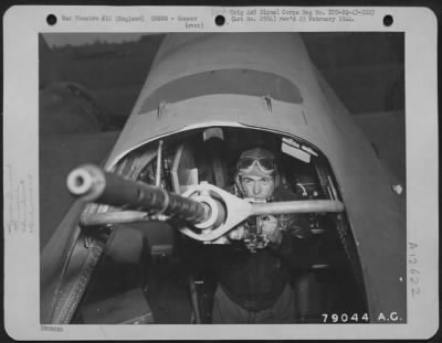 Gunner > T/Sgt. James Moore Of Long Island,  New York, A Gunner On The Boeing B-17 "The Bad Penny" Makes A Final Check On His Gun Just Before The Plane Takes Off On Another Mission Over Enemy Territory From Its Base In Cambridge, England.  6 May 1943.