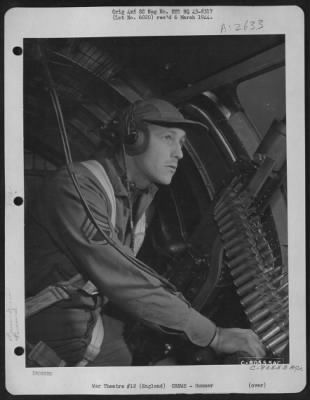 Thumbnail for Gunner > S/Sgt. Charles H. Marson Of Boothbay Harbor, Maine, Waist Gunner On A Boeing B-17 Based At Molesworth, England, Mans His Gun During A Mission Over Enemy Territory.  6 November 1943.