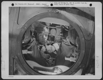 Gunner > S/Sgt. Norman A. Sampson Of Mason City, Iowa, Ball Turret Gunner On A Boeing B-17 Based At Molesworth, England, Is Shown At His Position During A Mission Over Enemy Territory.