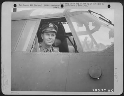 Navigator > Capt. Frank Kappeler, Navigator From Alameda, California, Is Shown In His Plane Before Take-Off For A Mission From His Base At Colne, England.  He Is A Member Of The 323Rd Bomb Group.  21 July 1943.
