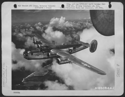 Consolidated > The Consolidated B-24 Liberator 'Bolivar' Flies Towards Harmon Field , Guam, Marianas Islands On 6 June 1945.