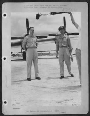 Consolidated > Left:  Maj. Thomas W. Ferebee, Bombardier Of B-29 'Enola Gay' Which Atom-Bombed Hiroshima, Japan.  Right:  Maj. Monahan, Public Relations Officer From Washington, D.C.  Marianas Is.