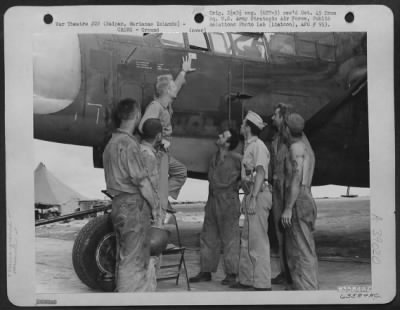 Consolidated > Lt. D.F. Haberman Points Proudly To His First Jap 'Score Flag' On The Nose Of His Northrop P-61 'Black Widow' As Far As It Is Known This Is The First P-61 To Shoot Down An Enemy Plane.  Saipan, Marianas Islands, 1 July 1944.