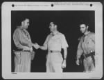 Marianas Islands.  Major Charles W. Sweeney, Pilot Of The B-29 'Bockscar' Which Dropped The Atomic Bomb On Nagasaki, Japan, 9 August 1945, Is Shown Before His Mission Shaking Hands With Colonel Paul W. Tibbets, Pilot Of The B-29 'Enola Gay' Which Atom-Bom - Page 1