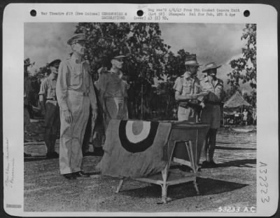 Thumbnail for Consolidated > General Ennis C. Whitehead and Air Commodore at formal Australian award presentation ceremony at an air base somewhere in New Guinea.