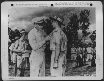 Thumbnail for Consolidated > General Ennis C. Whitehead decorating Pilot Officer John S. Archer with Silver Star. New Guinea.