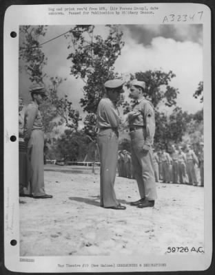 Thumbnail for Consolidated > New Guinea, 15 September 1943, the Distinguished Flying Cross and the Air Medal were presented to S/Sgt. John A. Filip. S/Sgt. Filip flies as gunner on a Consolidated B-24 Liberator bomber of the "Jolly Roger" Unit, so called because of the large