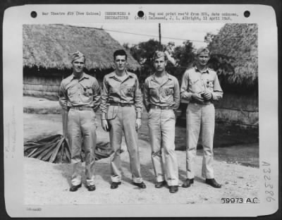 Thumbnail for Consolidated > For heroic actions against the Japanese in flights over New Guinea and New Britain these four Boeing B-17 Flying Fortress members were decorated at ceremonies at an advanced operational base. They are left to right: S/Sgt. Guy W. Clary of Gaffney