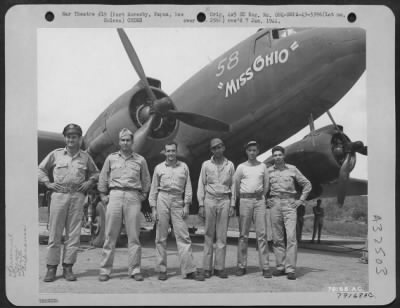 Thumbnail for Consolidated > C-47 transport plane "Miss Ohio" and its crew from 6th Troop Carrier Sq., 5th Air Force, Wards Drome, Port Moresby, New Guinea. Left to right: Lt. Blesch Malmstone, Wayland, Mich., pilot; Lt. Isaac W. Smith, Hutchison, Kansas, co-pilot; S/Sgt.