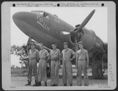 Thumbnail for Consolidated > C-47 transport plane "Polly" and its crew from 6th Troop Carrier Sq., 5th Air Force, Wards Drome, Port Moresby, New Guinea. Lt. John M. Rodgers, Birmingham, Ala., pilot; 2nd Lt. John P. Fairey, Richmond, Va., co-pilot; Cpl. Wesley W. Klar, Brenham