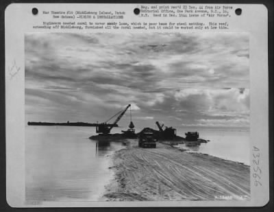 Thumbnail for Consolidated > Engineers needed coral to cover sandy loam, which is poor base for steel matting. This reef, extending off Middleburg, furnished all the coral needed, but it could be worked only at low tide.