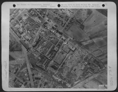 Consolidated > BEARINGS PLANT HIT---At the Kugelfischer ball bearings works at Schweinfurt, three machine shops, two small shops and sheds and buildings of other sizes were partially destroyed as shown on this reconnaissance photo taken a few days after the April
