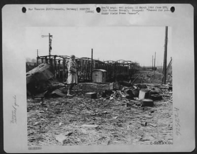 Thumbnail for Consolidated > The remains of a string of freight cars in the railroad yard at Stommeln, Germany, results of a 9th AF fighter-bomber attack carried out to deny enemy troops key rail facilities.