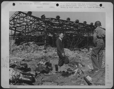 Consolidated > The Skeletonized Building That Used To House The Deurag- Nerag Oil Refinery.  Dr. Albrecht Told The American Photographers That He Is Very Happy Now That The Refinery Is In Allied Hands.  He Is Tired Of Salvaging And Rebuilding His Complicated Refinery, H