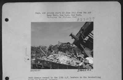 Consolidated > Bomb Damage Caused By The 15Th Af Bombers To The Marshalling Yards In Muldorf, Germany.