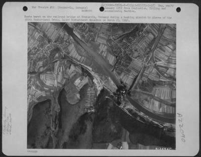 Consolidated > Bombs Burst On The Railroad Bridge At Neckarelz, Germany During A Bombing Mission By Planes Of The 320Th Bombardment Group, 443 Bomb. Squadron On March 23 1945.