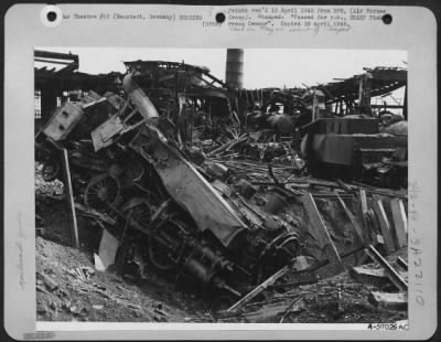 Consolidated > Bomb Made Scrap Heap Which Was Once The Roundhouse And Repair Shops Of The Neustadt Rail Yards, In Germany.  Attacks Such As This Helped To Pave The Way For The Allied Armies Advancing Across The Upper Rhine.