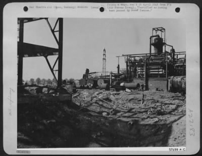 Consolidated > Synthetic Oil Plant, Oppau, Germany, Chemical Industry -- Great Bomb Craters, Results Of Allied Air Attacks, Punctuate The Synthetic Oil Plant.  Vigorous Efforts At Reconstruction To Keep This Plant In Operation And The Luftwaffe Supplied With Fuel Were F