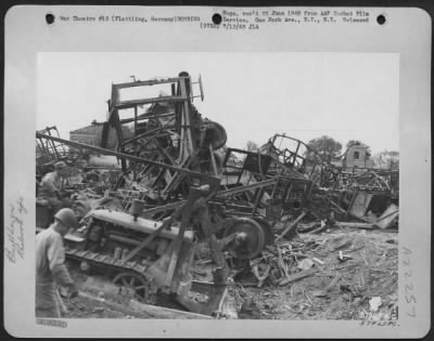 Thumbnail for Consolidated > Bulldozer Filling In Bomb Craters In The Marshalling Yards At Plattling, Germany.  June 1945.