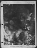 Burning Nazi Airdrome -- At The Rotenburg Aircraft Depot In Germany, Consolidated B-24 Liberators Of The Us 8Th Aaf Set The Stage For This Picture With Their Concentrated Attack On 30 May 44.  Many Large Workshops Were Set Afire. - Page 1