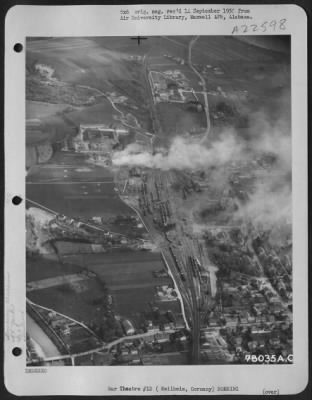 Consolidated > Bombs Burst On Weilheim Marshalling Yards, Germany During A Bomb Raid By 14Th Fighter Group.  Note - Lockheed P-38 Lightning In Photo.  19 April 1945.