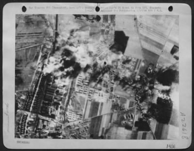 Thumbnail for Consolidated > Berlin Plant In Flames -- American Bombs Again Find Their Mark On Berlin Targets At The Berliner Mashinenvau Armament And Locomotive Works At Wernsdorf, A Suburb Of Berlin, During Wednesday'S 8 March 1944 Heavy Attack On The Berlin Area.  Approx. 1/3 Of T