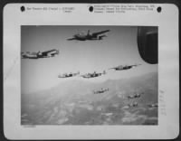 North American B-25 Mitchells of the First Tactical Air Force fly over rugged Italian country as they approach their target. These medium bombers have been steadily smashing at roads, bridges and communication links behind the enemy's lines hampering - Page 3