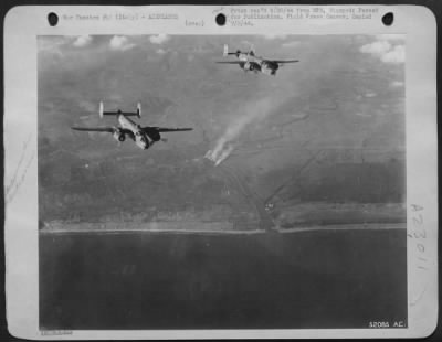 Thumbnail for Consolidated > Early in the big offensive on the Italian front these North American B-25 Mitchells of the First Tactical Air Force began smashing at enemy posts. They are winging their way over the Garigliano River, a short distance behind the American lines. The