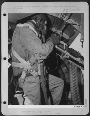 Consolidated > ITALY-In addition to his duties as an aerial photographer, Sgt. Ryder also serves as a waist gunner when enemy fighters attack.